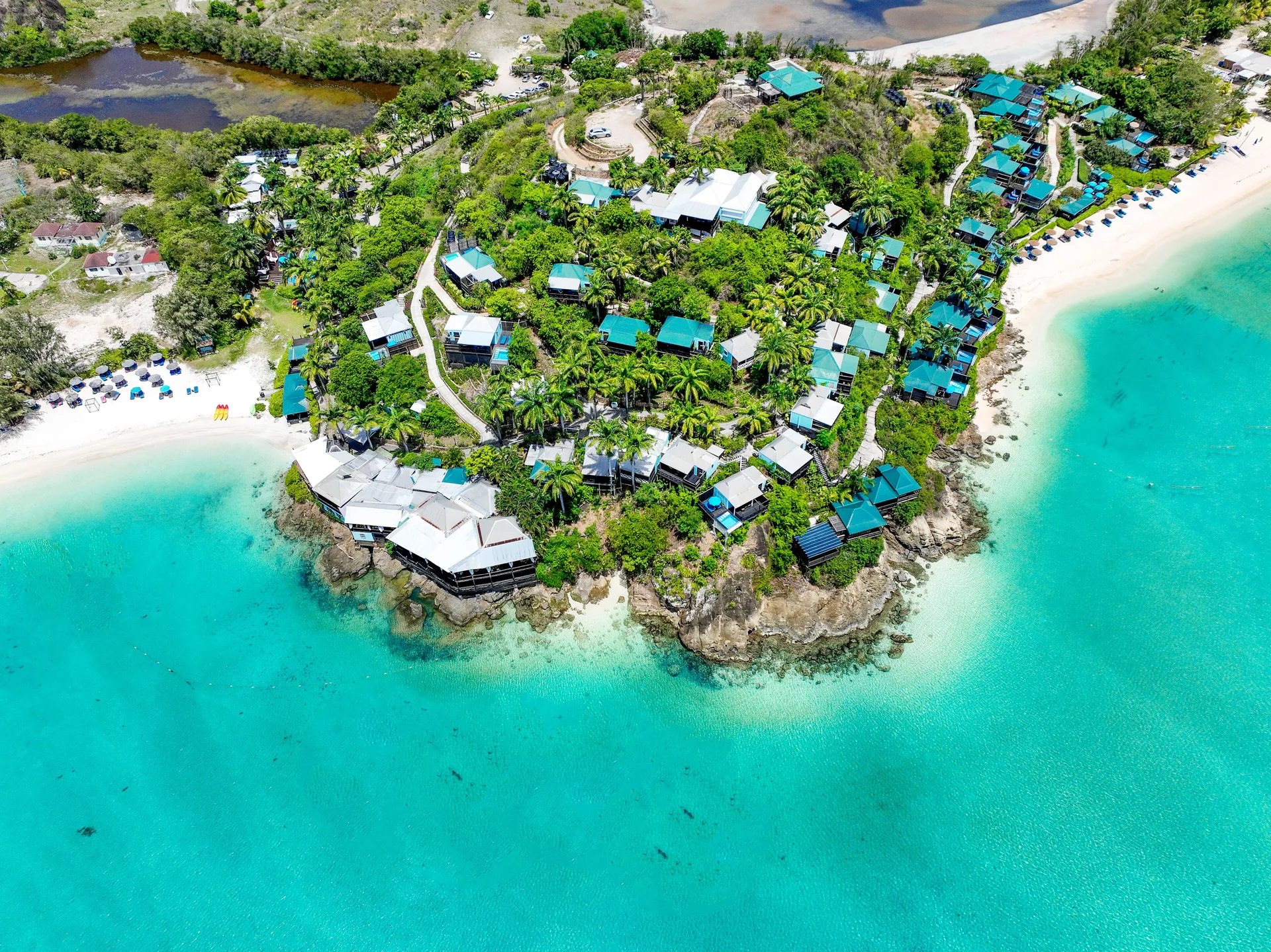 COCOS Hotel couples-focused all-inclusive resort with rustic cottages and panoramic Caribbean Sea views